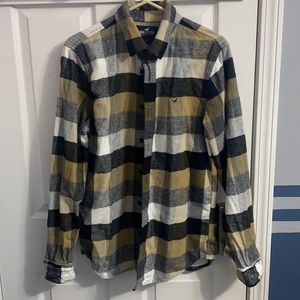tan, white, grey, and black hollister flannel.
